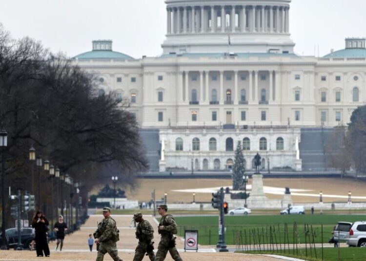 Suspect in Guard shooting drove across U.S. to carry out attack, officials say