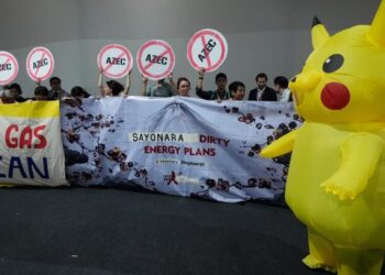 Protesters in Pikachu costumes demand Japan end fossil fuel financing at U.N. climate conference