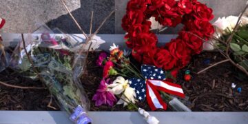 Suspect in shooting of National Guard members now facing a first-degree murder charge