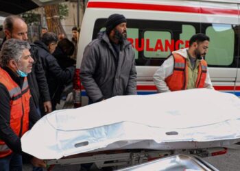 Israeli forces kill at least 13 people in southern Syria raid, officials and residents say