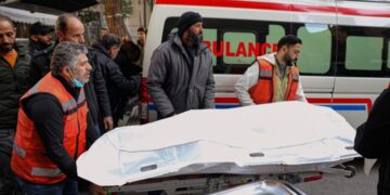 Israeli forces kill at least 13 people in southern Syria raid, officials and residents say