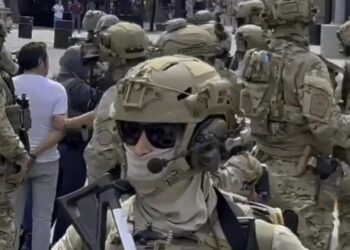 Justice Department sues to block laws restricting masked, unidentified law enforcement officers in California