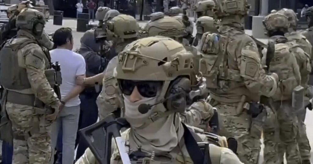 Justice Department sues to block laws restricting masked, unidentified law enforcement officers in California