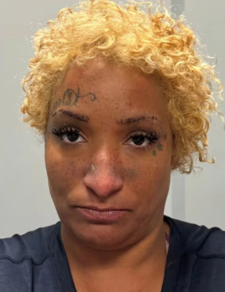 Mugshot of Camille Benson.