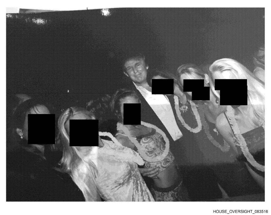 Black and white image of Donald Trump surrounded by masked individuals.
