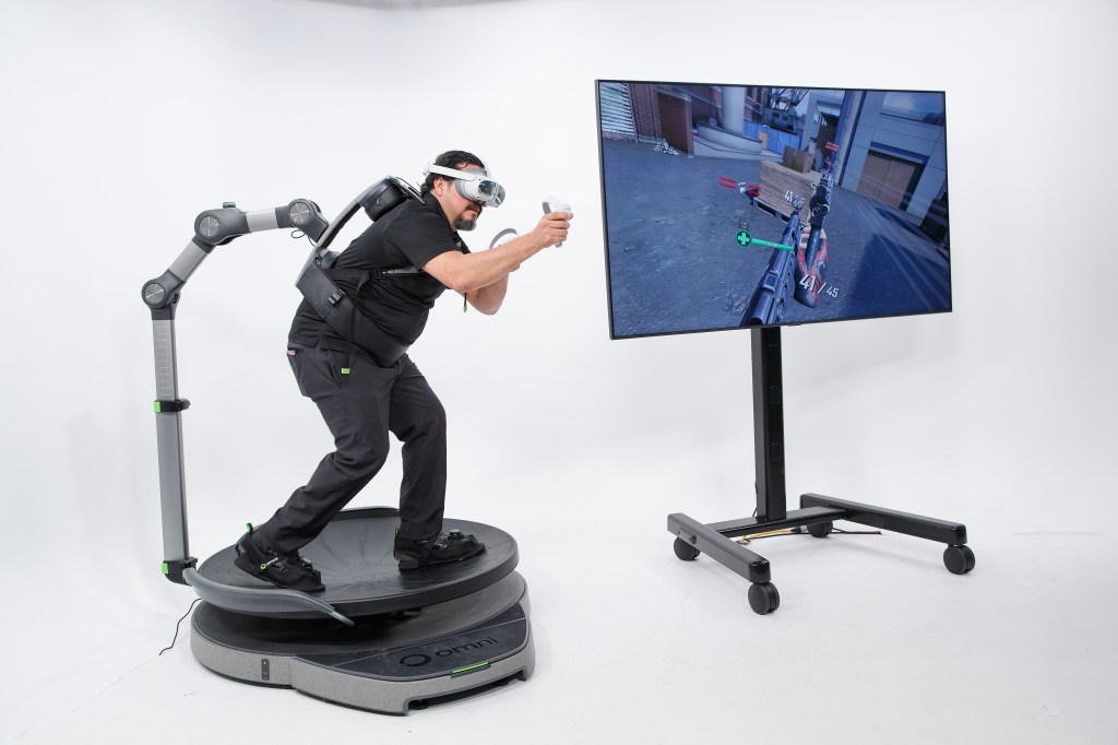 Omni engineer David Hernandez testing the Omni One virtual reality system.