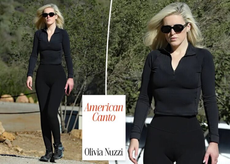 Scorned Olivia Nuzzi stays stoic for paparazzi photo shoot after complaining about being followed