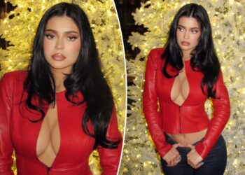Kylie Jenner rings in the holiday in plunging red leather cropped jacket
