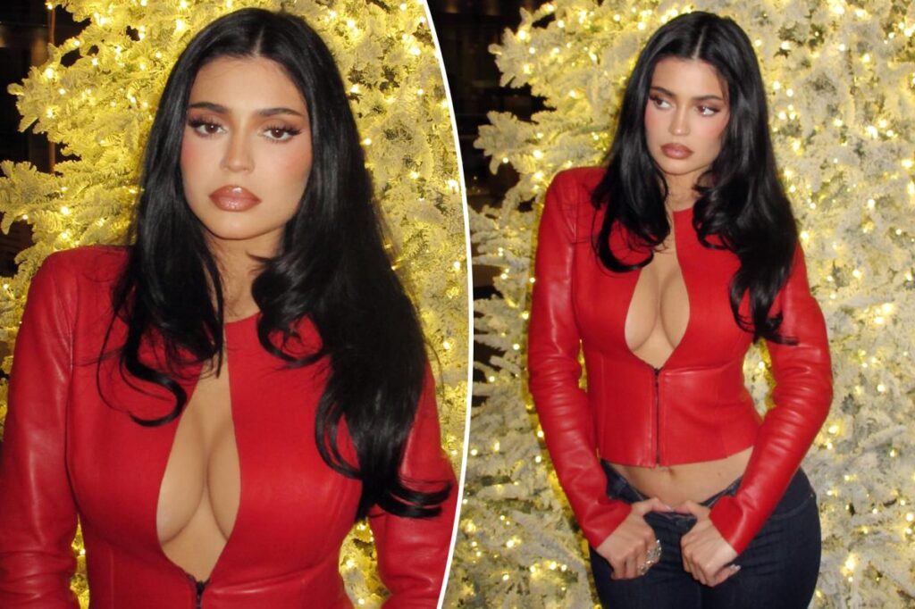 Kylie Jenner rings in the holiday in plunging red leather cropped jacket