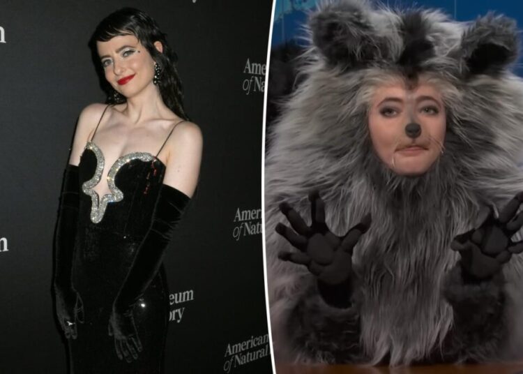 ‘SNL’ star Sarah Sherman dresses up as the viral drunk raccoon in chaotic ‘Weekend Update’