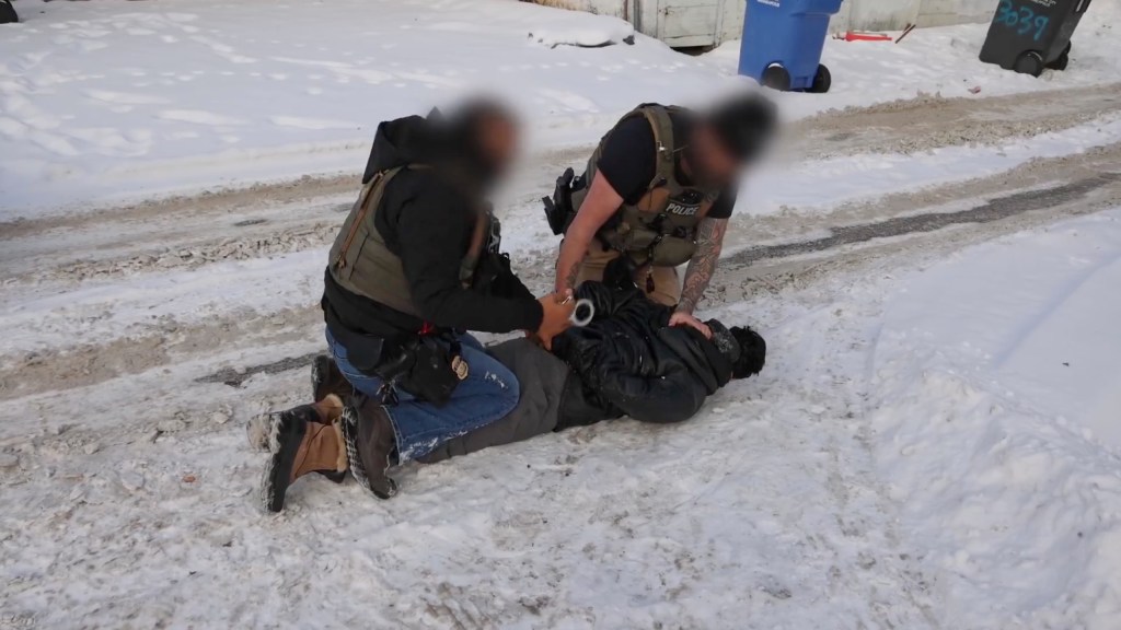 Two blurred men, one in a