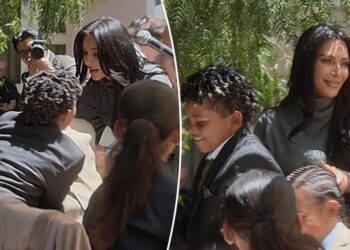 Kim Kardashian mortified as sons fight on stage during her law school graduation party