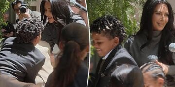 Kim Kardashian mortified as sons fight on stage during her law school graduation party