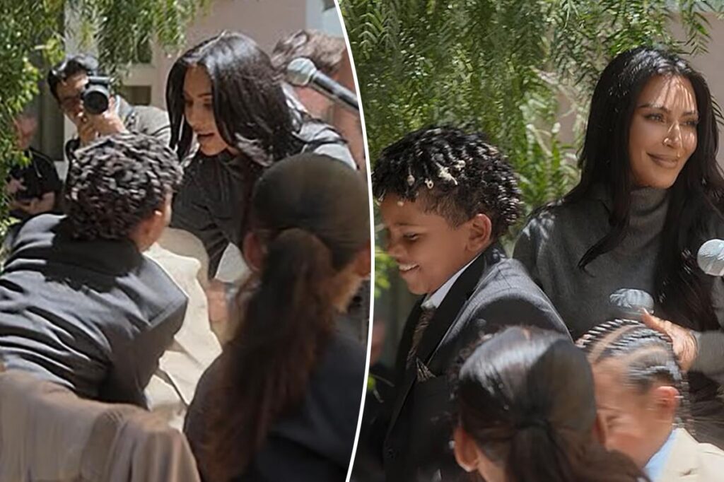 Kim Kardashian mortified as sons fight on stage during her law school graduation party