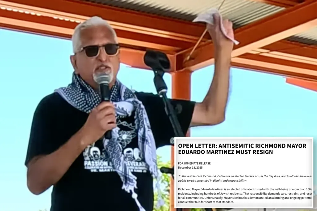 A man with sunglasses and a keffiyeh scarf holding a microphone and speaking at a rally, with a portion of an open letter titled 