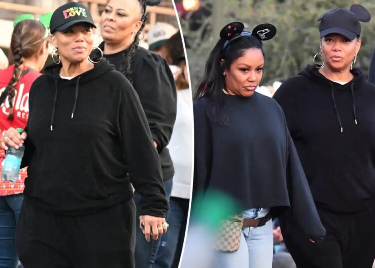 Queen Latifah enjoys rare family outing with longtime partner Eboni Nichols at Disneyland