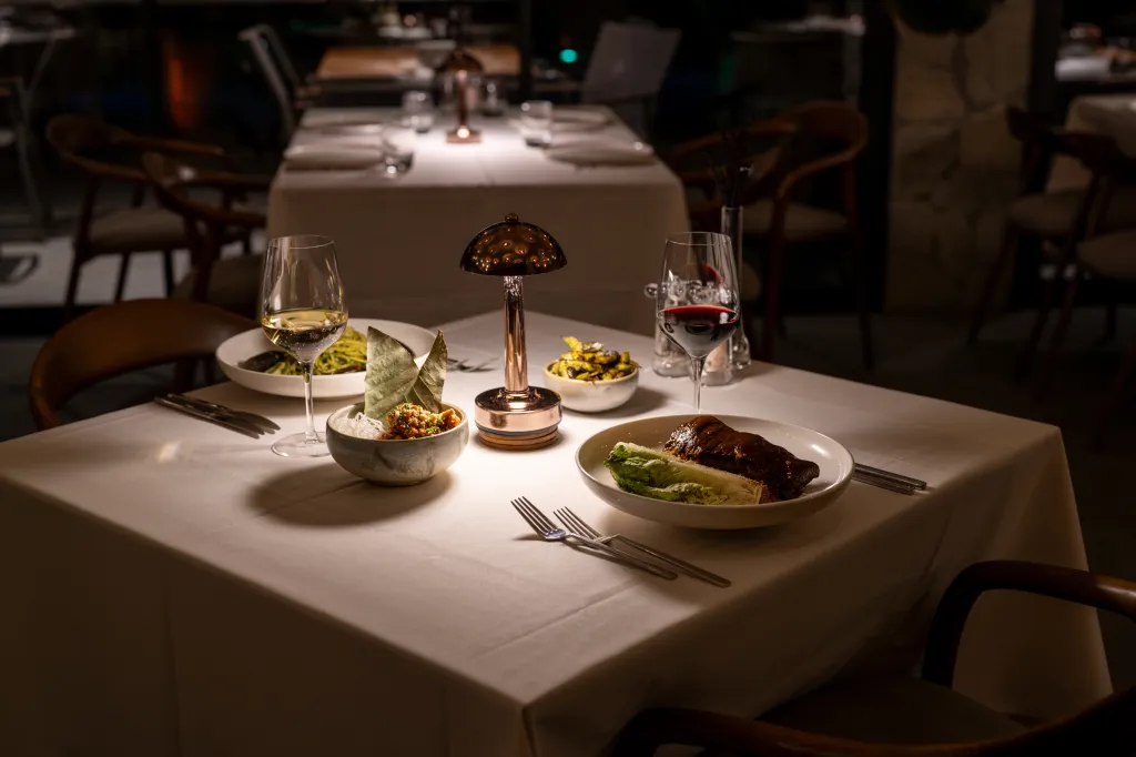 Elegant dinner at a fancy restaurant table.