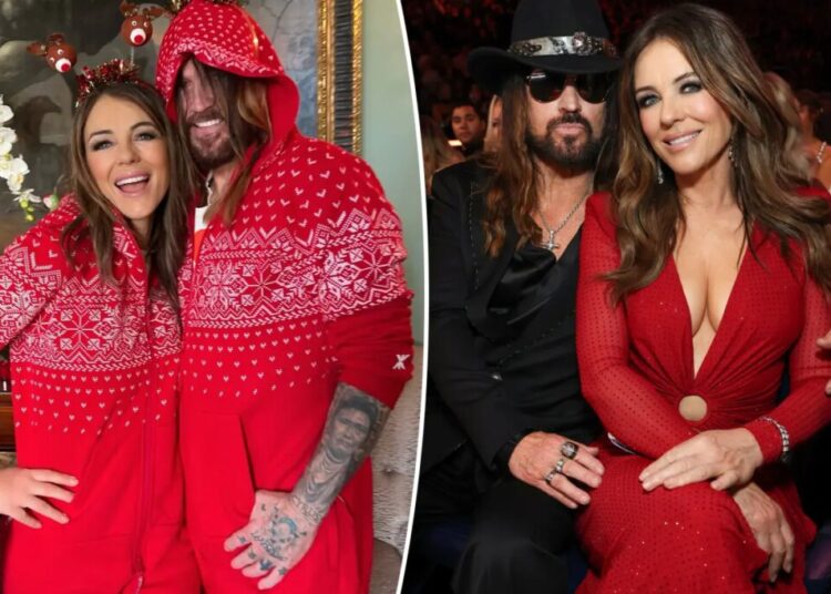 Billy Ray Cyrus and Elizabeth Hurley mark their first Christmas as a couple in matching onesie pajamas