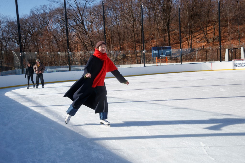 A woman ice skating at Gottesman Rink in Central Park.