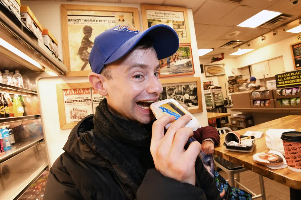 New Yorker Kurt Adams, 36, grabs a cookie at Zabar's