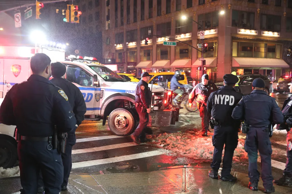 Police at the scene of a male shot on W 57th Street and 6th Ave in Midtown, he was removed to the hospital in unknown condition