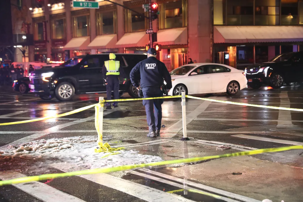 Police at the scene of a male shot on W 57th Street and 6th Ave in Midtown, he was removed to the hospital in unkown condition