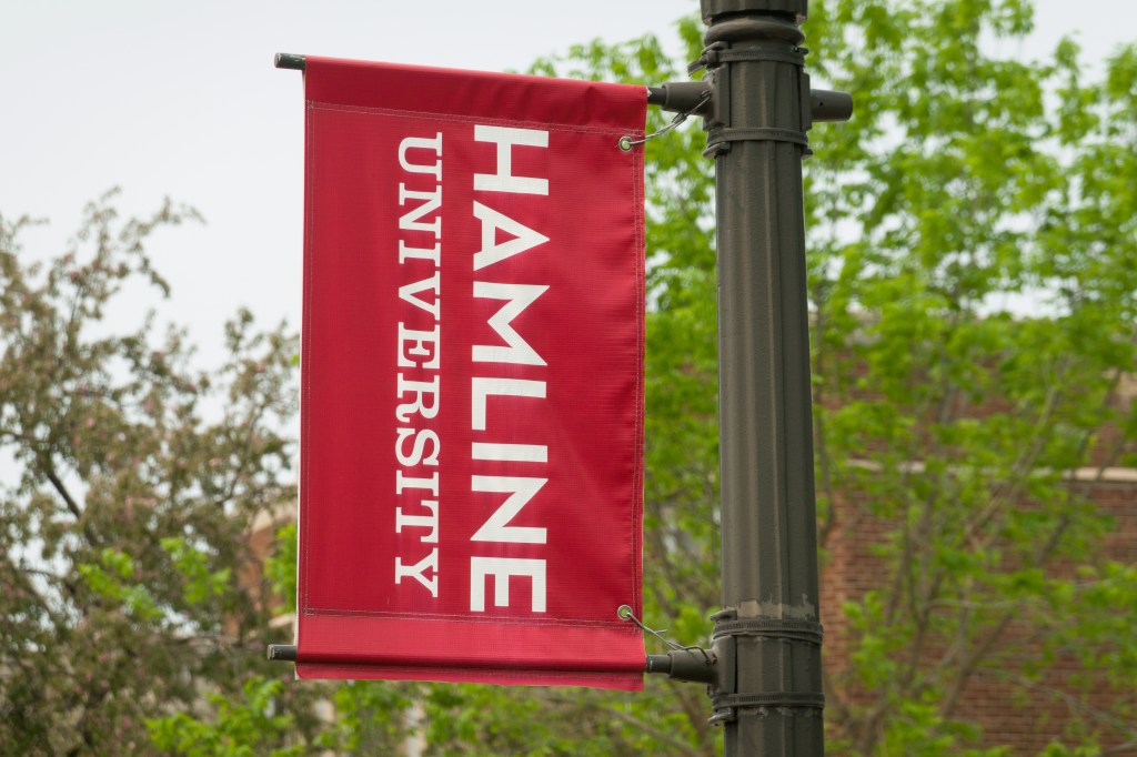 Red banner on campus with