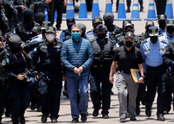 As Trump Threatens to Bomb Venezuela’s Maduro for Trafficking Drugs, He Pardons an Ex-President Convicted in a Drug Case