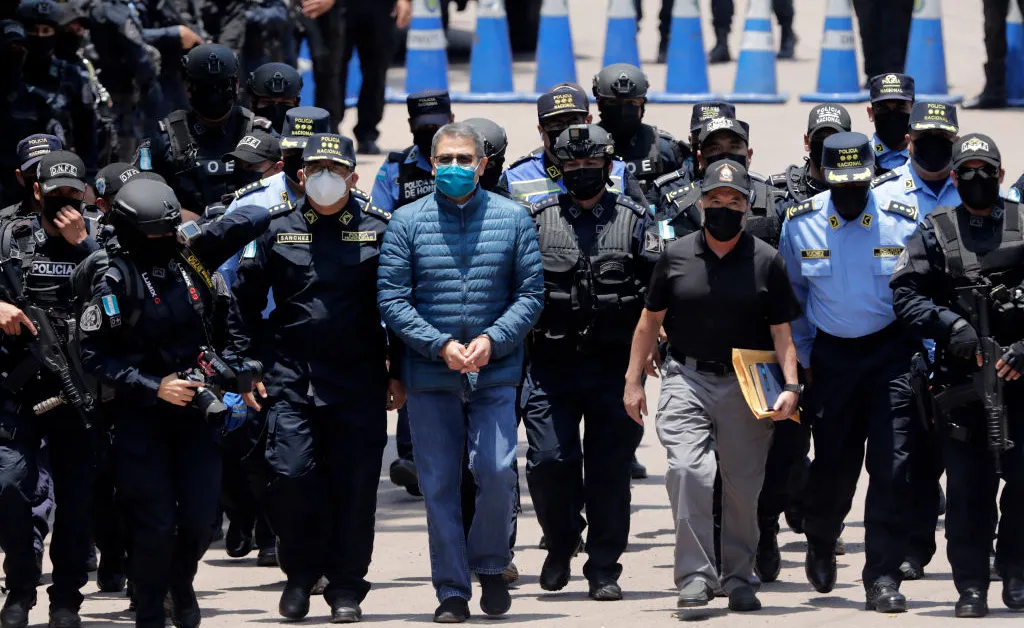 As Trump Threatens to Bomb Venezuela’s Maduro for Trafficking Drugs, He Pardons an Ex-President Convicted in a Drug Case