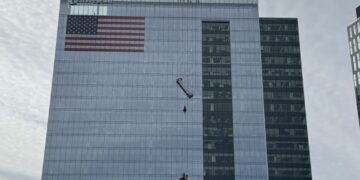 Workers rescued after dangling from window-washing platform