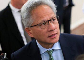 Nvidia’s CEO says AI adoption will be gradual, but when it does hit, we may all end up making robot clothing