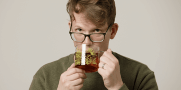 Millionaire YouTuber Hank Green tells Gen Z to rethink their Tesla bets—and shares the portfolio changes he’s making to avoid AI-bubble fallout