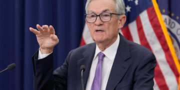 Federal Reserve cuts rates again, signals one more cut next year