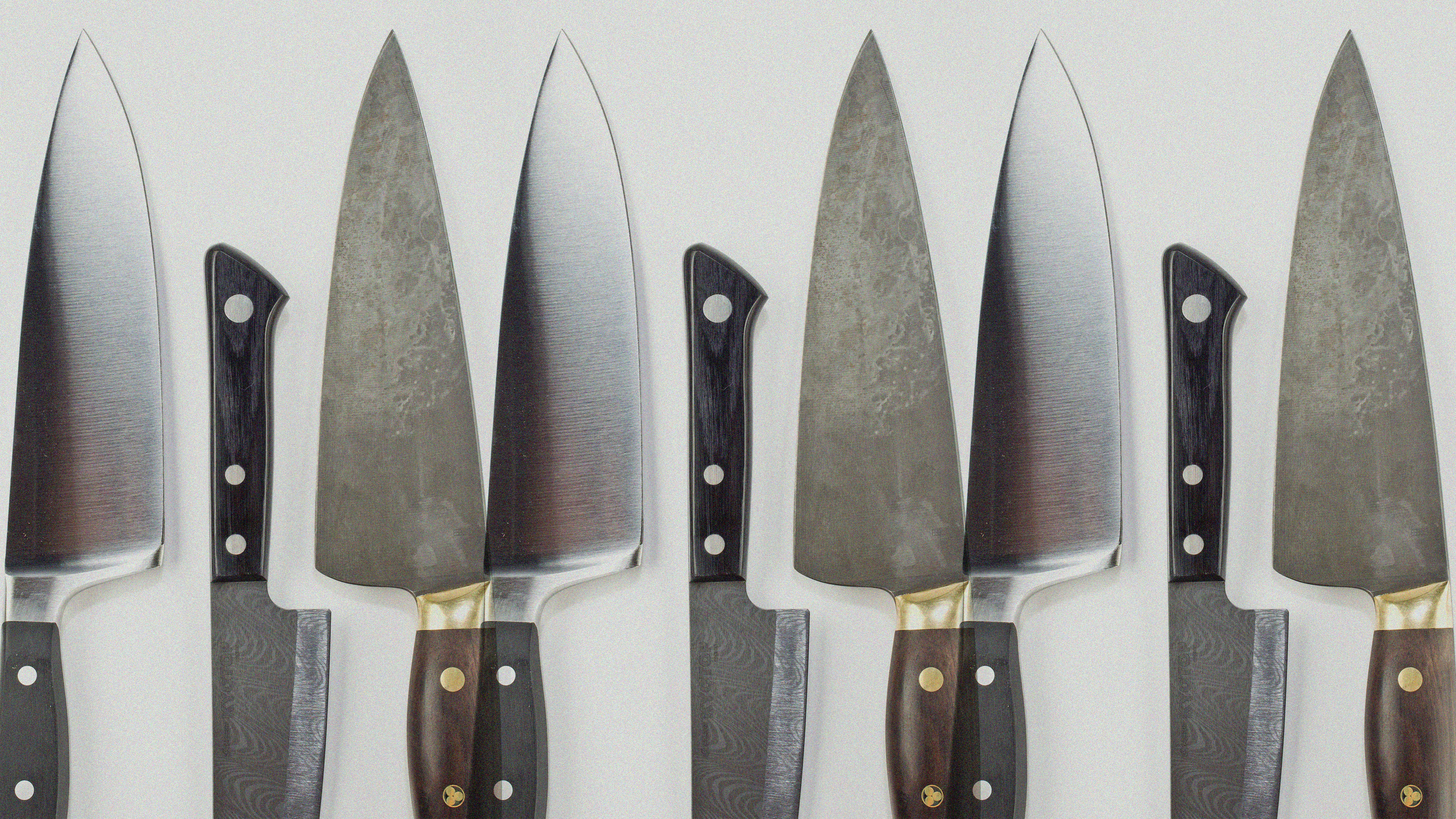 Photo illustration of stainless-steel knives next to carbon-steel knives