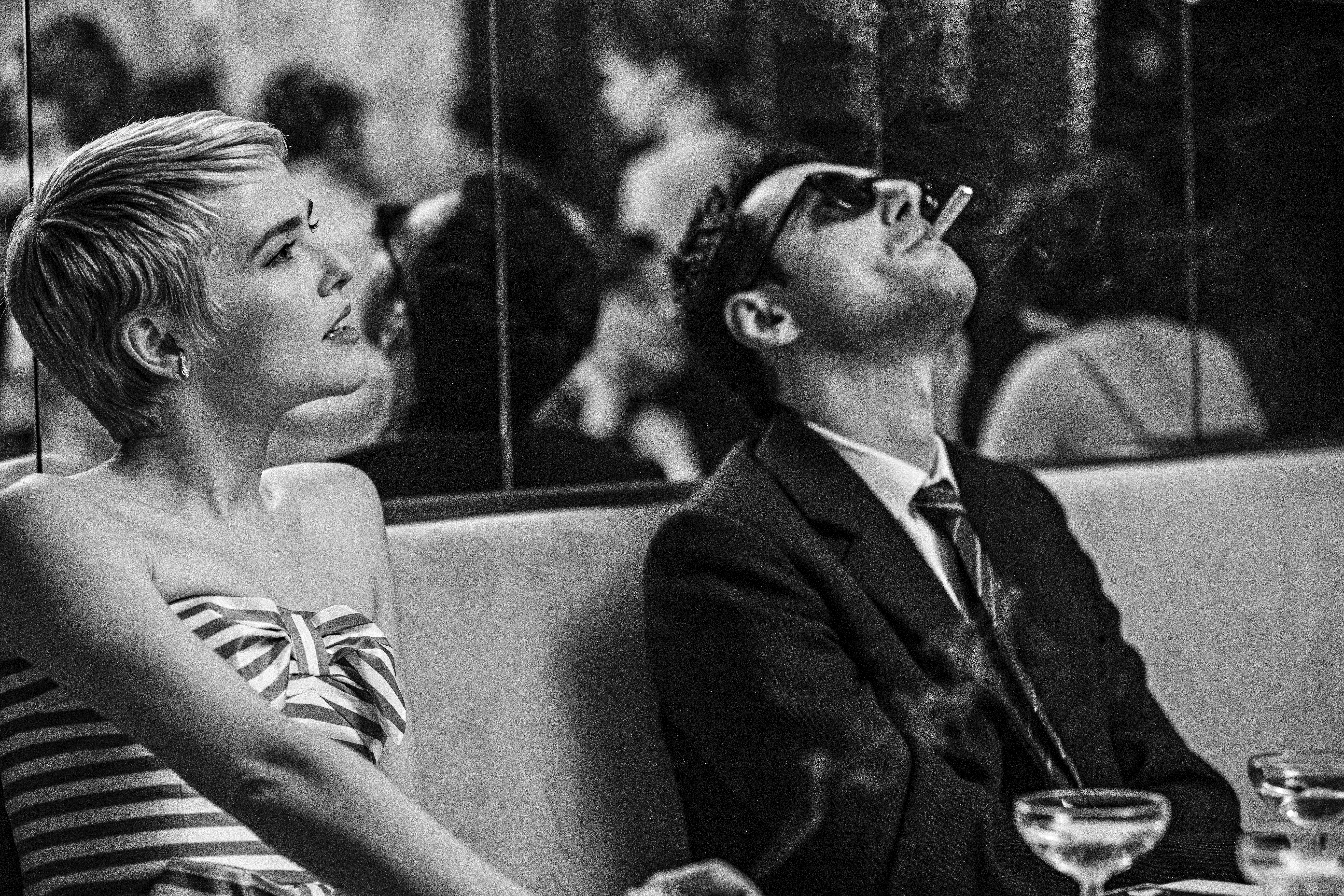 From left to right: Zoey Deutch as Jean Seberg and Guillaume Marbeck as Jean Luc Godard in the Netflix movie Nouvelle Vague