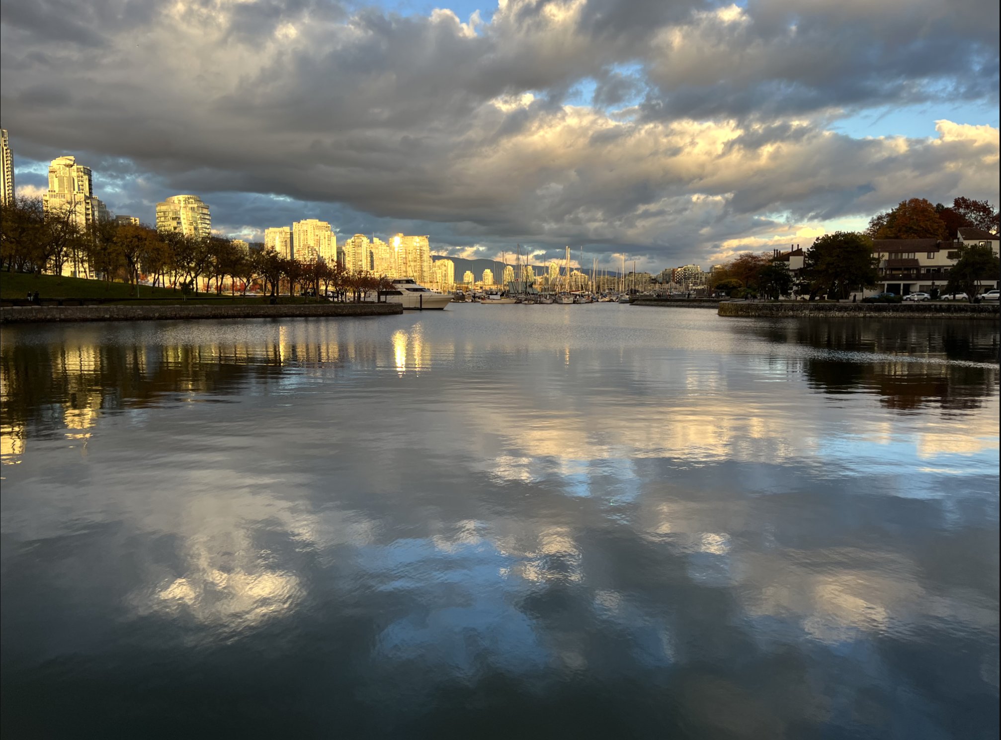 An image of buildings reflected on the water