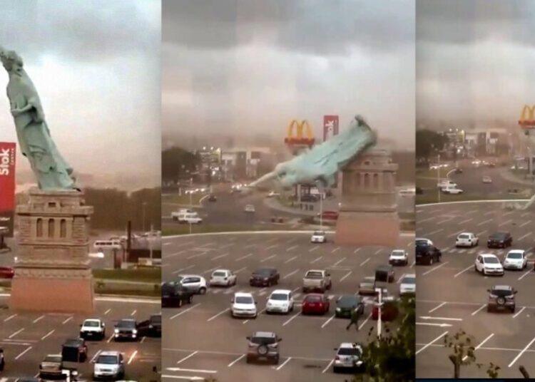 Replica Statue of Liberty Topples in Urban Hellscape