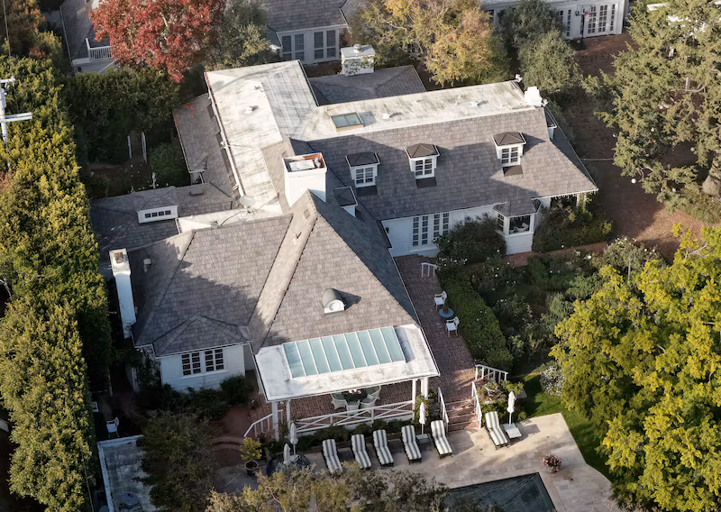 BRENTWOOD, CALIFORNIA - DECEMBER 16: An aerial view of director Rob Reiner's home on December 16, 2025 in Brentwood, California. The LAPD confirmed that Rob Reiner and his wife Michele Singer Reiner were found dead in their Brentwood home. Their son Nick was arrested in connection to their deaths and will be charged with two counts of first-degree murder, according to the Los Angeles County district attorney. (Photo by Mario Tama/Getty Images)