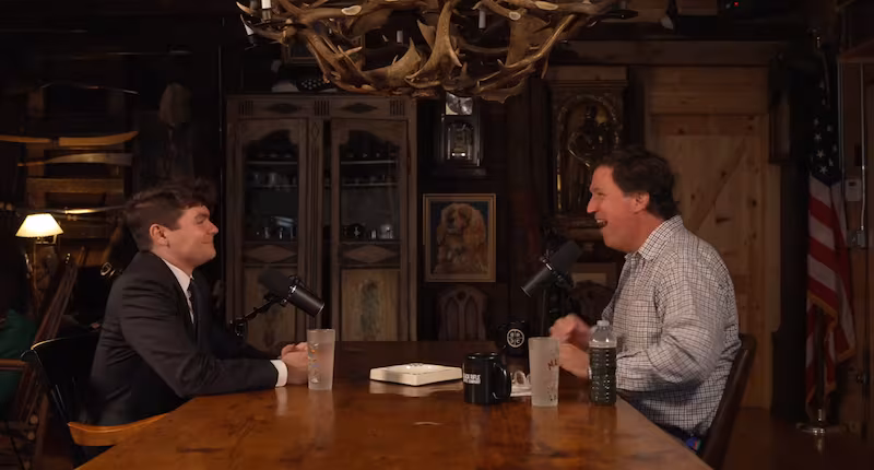 Nick Fuentes, 27, and Tucker Carlson, 56, were all smiles during their more-than-two-hour interview last week.