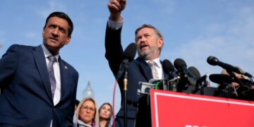 Congressmen who pushed to release Epstein files say massive blackout doesn’t comply with law and ‘are exploring all options’ — including impeachment