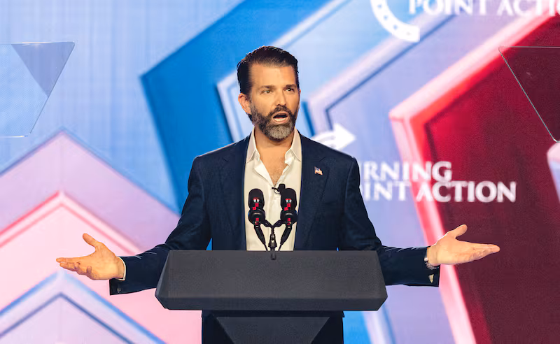 Donald Trump Jr. speaks on stage during Turning Point's annual AmericaFest conference in Phoenix, Arizona on December 21, 2025.