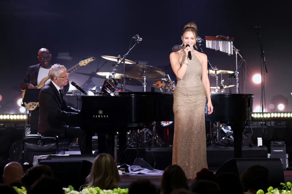 David Foster and Katharine McPhee perform during Gateway Celebrity Fight Night 2024 in Scottsdale, Arizona