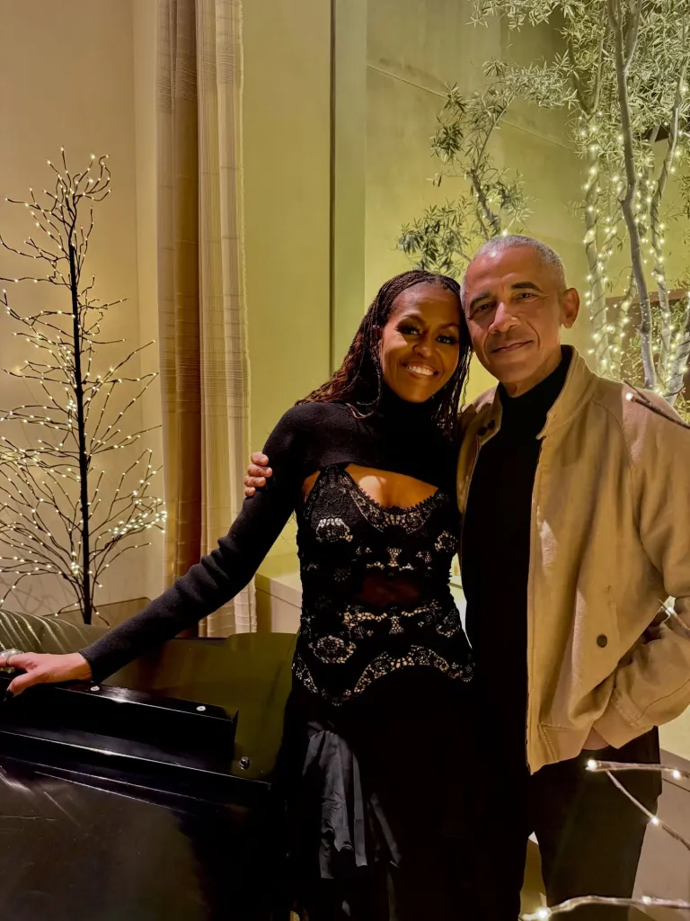 Michelle and Barack Obama prove they're still going strong with cozy Christmas pic