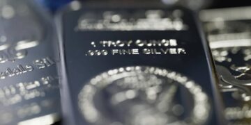 Silver rises to record above $80 in historic end-of-year rally