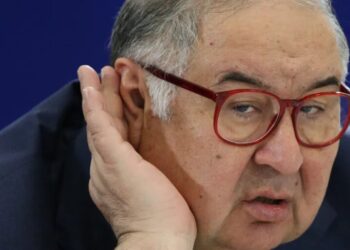 Putin ally Alisher Usmanov agrees to pay $11.8 million fine to resolve German federal probe
