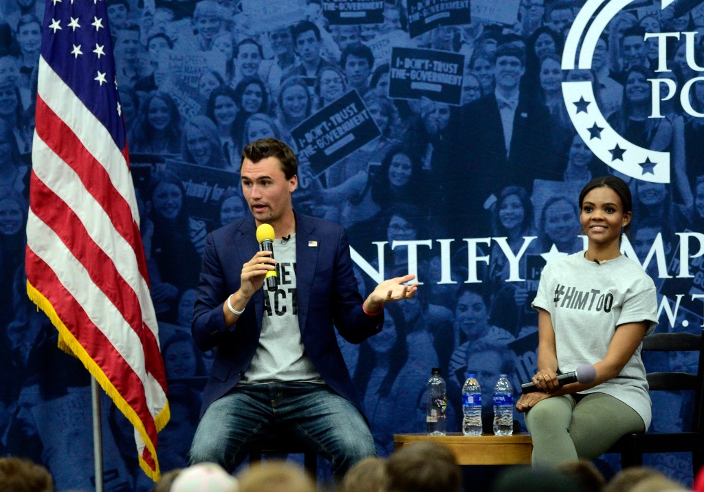Charlie Kirk and Candace Owens speak at a Turning Point USA event.