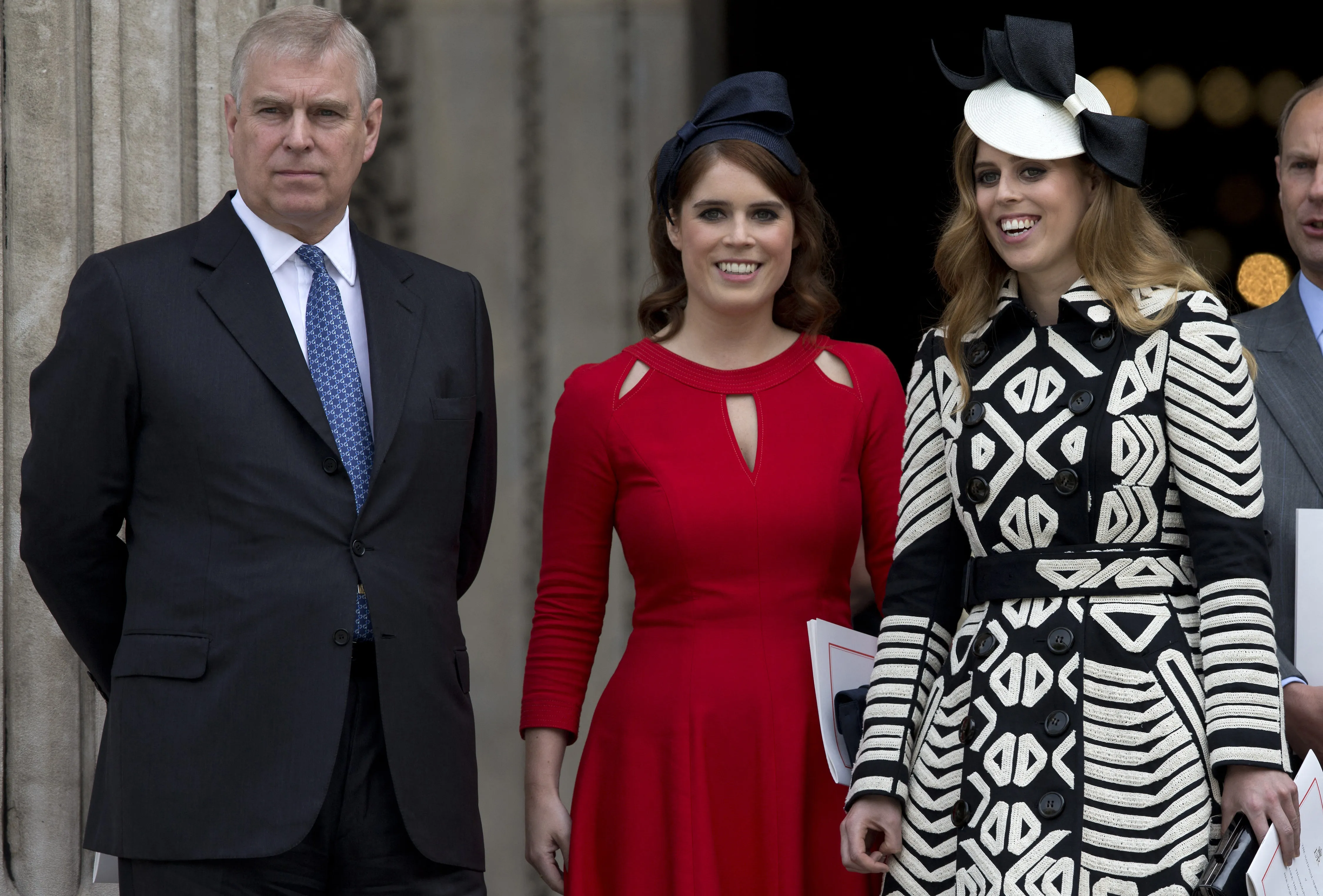 The former Prince Andrew and his daughters, Eugenie and Beatrice.
