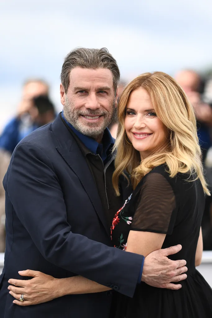 John Travolta and Kelly Preston embracing each other at the 71st Cannes Film Festival.