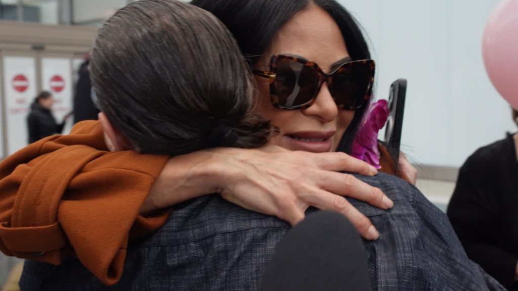 Jen Shah hugging someone after being released from jail.