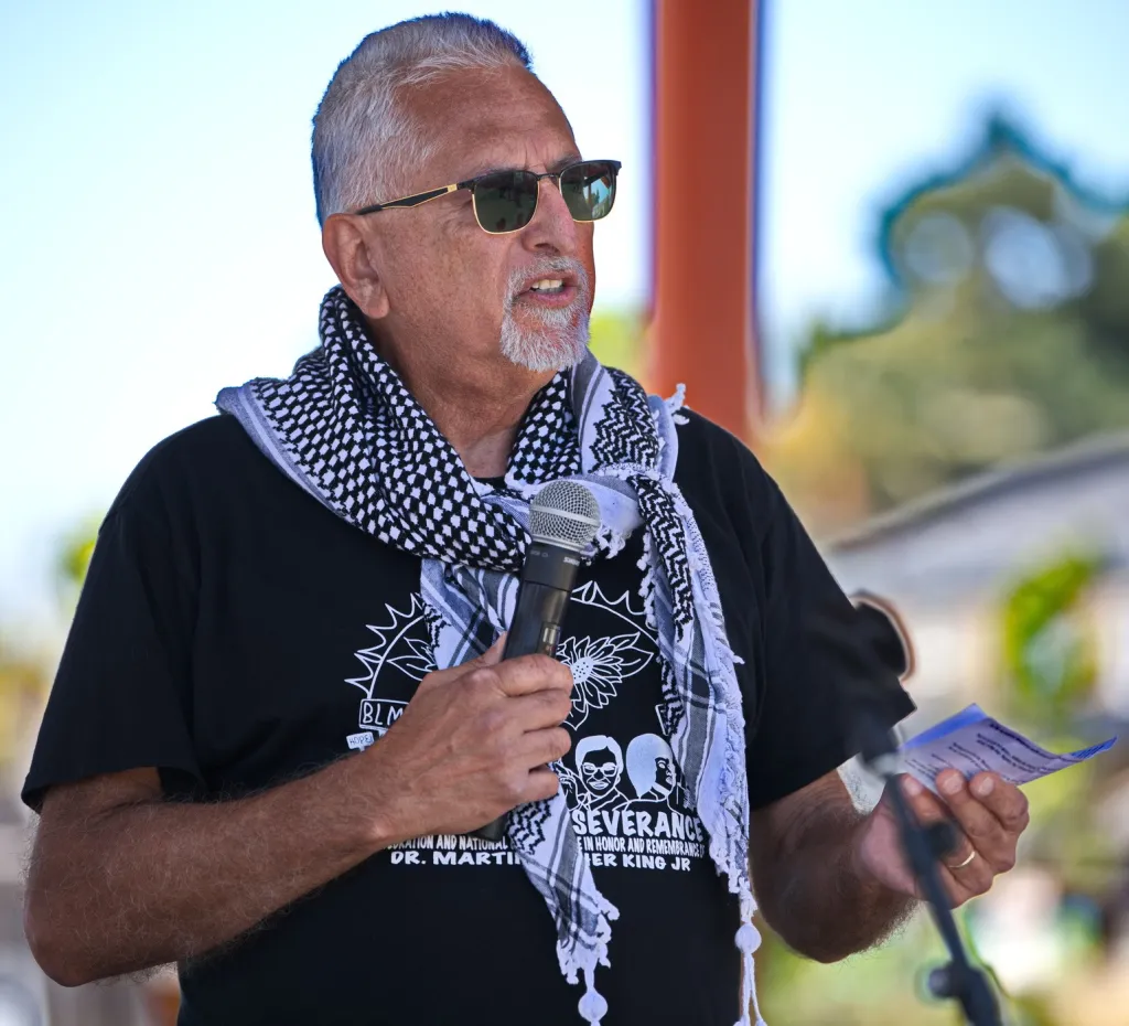 Eduardo Martinez speaks at Anti Chevron Day.